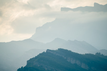 View of the mountains and blue sky with clouds at sunset. Dagestan, Russia. Beautiful summer landscape. Mountains backgroundの写真素材