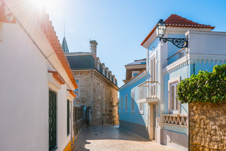 Old colorful architecture on the street in Cascais, Portugal. Beautiful cityscape at sunny day. Famous travel destinationの写真素材