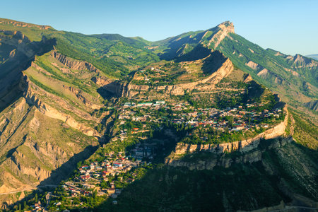 Gunib village in the mountains at sunrise in Dagestan, Russia. Beautiful summer landscape. Famous travel destinationの写真素材