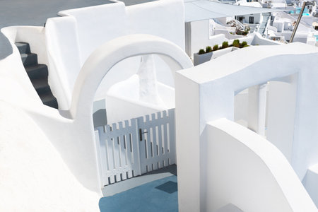 White cycladic architecture in Santorini island, Greece. Door and stairs of a hotel close upの写真素材