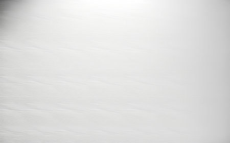 A close-up image of a white wooden surface, showing its texture and grain. Perfect as a minimalist background.の写真素材