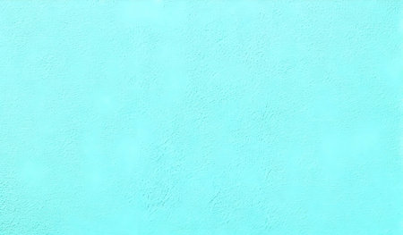A close-up of a light blue textured wall.