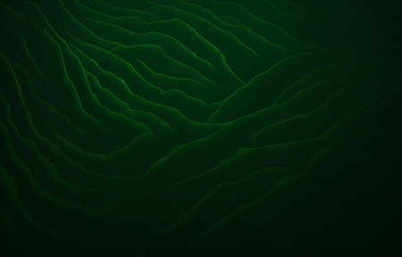 Abstract green hills forming a mesmerizing pattern. Deep green tones create a serene and mysterious atmosphere.の写真素材