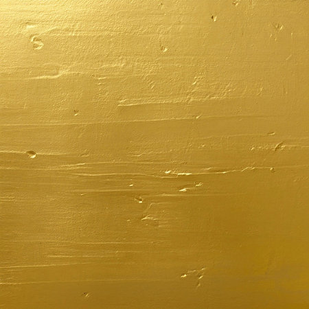 A luxurious gold-toned textured background. Perfect for design projects.の写真素材