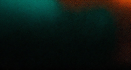 An abstract image featuring a gradient texture transitioning from warm orange to cool teal.