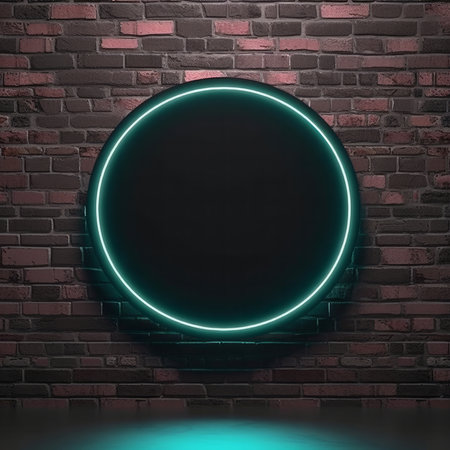 A vibrant neon circle mounted on a dark brick wall. Glowing teal light creates a modern, stylish background.の写真素材