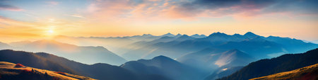Breathtaking sunrise over a vast mountain range. Serene and peaceful atmosphere.の写真素材