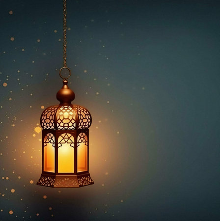 A golden Ramadan lantern hanging with a glowing light, illuminating the darkness.