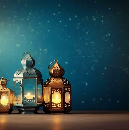 Three ornate lanterns with glowing candles stand on a wooden surface against a blue, sparkling backdrop. The lanterns are made of metal with intricate designs and symbolize the celebration of Ramadan and Eid.の写真素材