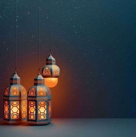 Three ornate lanterns hang illuminated against a dark blue background with a scattering of white stars.の写真素材