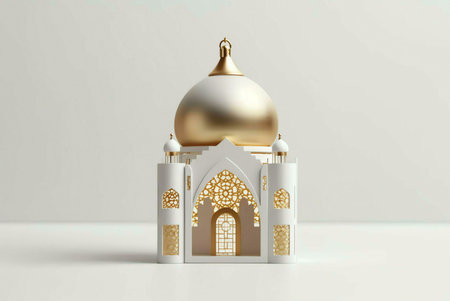 A miniature model of a mosque with a golden dome and intricate details.の写真素材