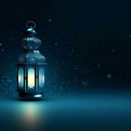 A beautifully crafted lantern sits illuminated against a dark blue background, with a subtle sparkle effect. The lantern is ornate and traditional, a symbol of light and hope in the darkness.の写真素材