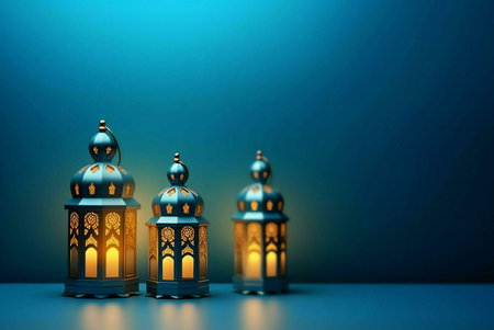 Three lit lanterns with ornate designs stand against a blue background.の写真素材