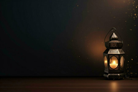 A traditional Ramadan lantern with a lit candle, glowing against a dark background with sparkles.の写真素材