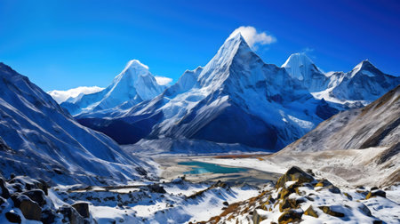 Stunning snow-capped Himalayan peaks and a serene glacial lake. A breathtaking winter landscapeの写真素材