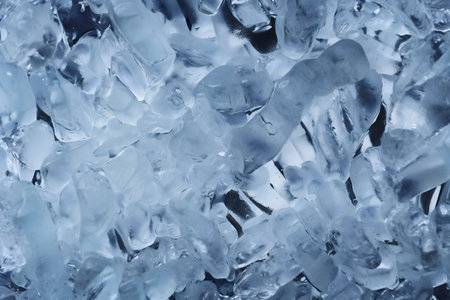 Close-up image of many ice crystals. Texture and color are dominant.