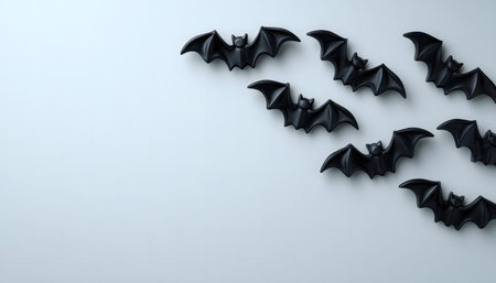 Black bats on light background. Halloween decoration.の写真素材
