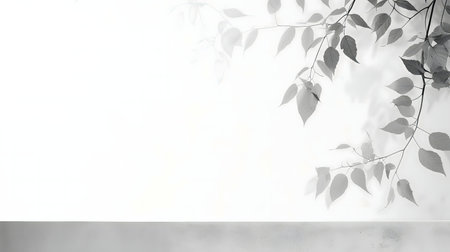 Subtle grayscale image featuring delicate leaves and branches. Peaceful and minimalist.の写真素材