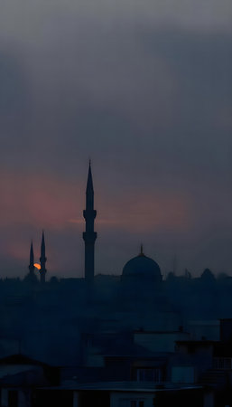A serene sunset silhouettes a mosque and its minarets. The city is shrouded in hazy twilight.