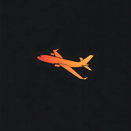 An orange airplane silhouette against a dark background. Minimalist and evocative of travel and adventure.の写真素材