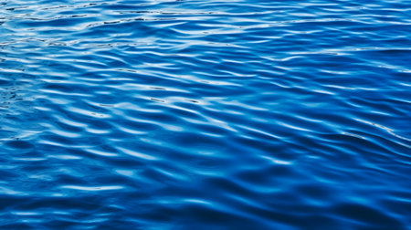 Stunning blue water texture. Peaceful ocean waves.の写真素材