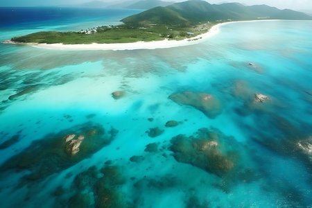 Stunning aerial shot of a pristine island with crystal clear turquoise waters. Paradise found!の写真素材