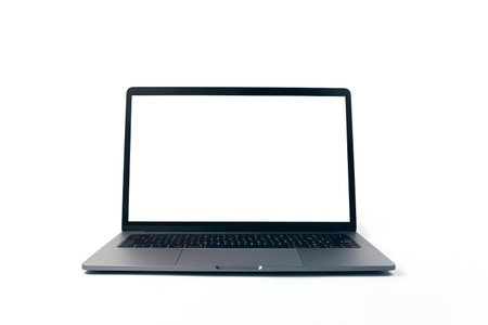 A clean image of a modern laptop with a blank screen, ideal for showcasing designs or ideasの写真素材