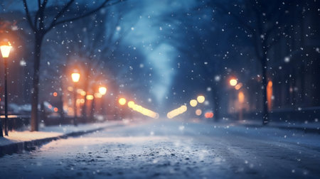 A snowy night street, softly lit by street lamps, evokes a calm winter atmosphere.の写真素材