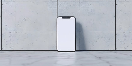 A sleek smartphone mockup with a blank screen, set against a minimalist concrete wall. Perfect for app or website presentations.の写真素材
