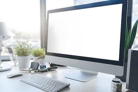 A clean and modern workspace featuring a computer, keyboard, mouse, and plants. Ideal for...