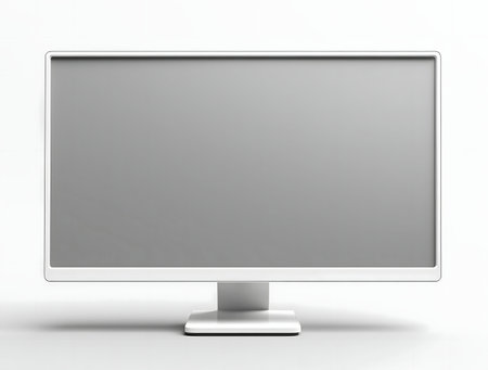 A clean image of a white computer monitor with a gray screen, isolated on a white backgroundの写真素材