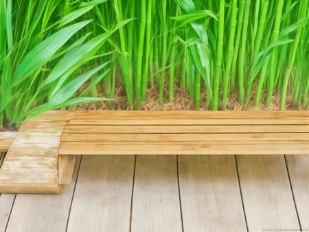 A wooden bench sits before a lush bamboo grove, creating a serene and peaceful atmosphere.の写真素材