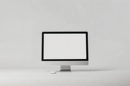 Clean image of a desktop computer with a blank screen. Perfect for a mockup.
