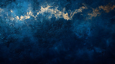 Abstract blue textured background resembling a night sky, cosmic canvas, or deep ocean. Dark, mysterious and artistic.の写真素材