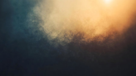 Abstract smoky image with a blend of golden and teal. Peaceful atmosphere.の写真素材