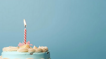 A single candle lit on a delicious birthday cake. Pastel colors, simple, festive.の写真素材