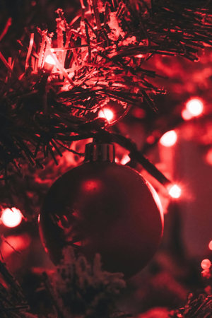 Christmas tree with red baubles and garland. Christmas backgroundの写真素材