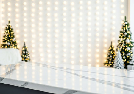 Empty white marble table top with christmas tree bokeh background.の写真素材