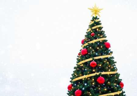 Christmas tree on snow background. Christmas and New Year holidays concept.の写真素材
