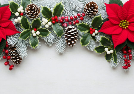 Christmas decoration with evergreen trees holly and poinsettiaの写真素材