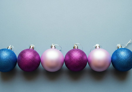Christmas balls on blue background. Top view with copy space for your text.の写真素材
