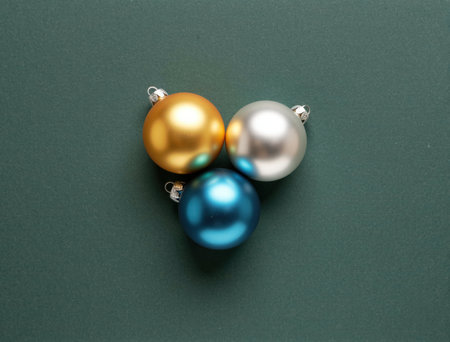 Christmas balls on a green background. Top view. Flat lay.の写真素材