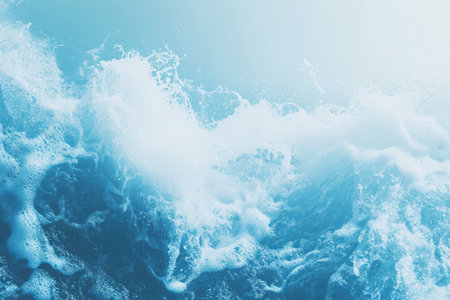 Dynamic crashing ocean wave with white sea foam and blue water splash.