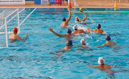 MATARO, SPAIN - OCTOBER 16, 2010: Unidentified players in action during water polo Quadis Tournament...