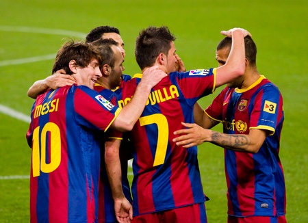 BARCELONA - JANUARY 12: Players celebrating a goal during football Spanish Cup match between FC Barcelona and Real Betis, final score 5 - 0. January 12, 2011 in Barcelona, Spainのeditorial素材