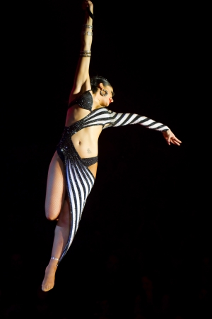 BARCELONA - APRIL 1: Unidentified acrobat woman performs during the spectacle Somnis of the circus Italiano on April 1, 2011 in Santa Coloma de Gramanet, Barcelona, Spainのeditorial素材