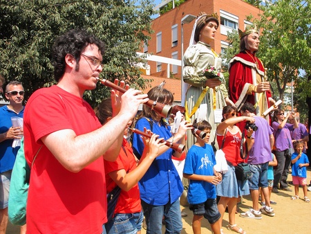 Some unidentified people at La Verema Wine Festival, a traditional party of Alella, with a traditional parade of Giants, on September 9, 2012 in Alella, Barcelona, Spainのeditorial素材