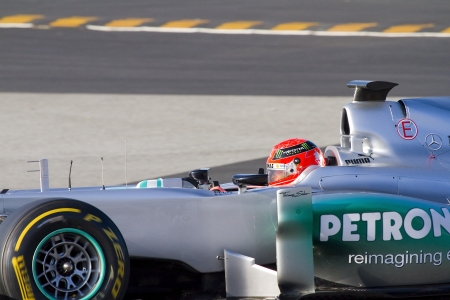 BARCELONA - FEBRUARY 21: Michael Schumacher of Mercedes F1 team racing at Formula One Teams Test Days at Catalunya circuit on February 21, 2012 in Barcelona, Spainのeditorial素材