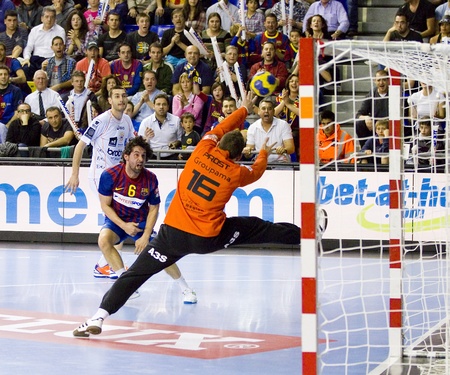 BARCELONA - MARCH 25: Juanin Garcia in action during EHF Champions League match between FC Barcelona and Montpellier, final score 36-20, on March 25, 2012, in Palau Blaugrana, Barcelona, Spainのeditorial素材