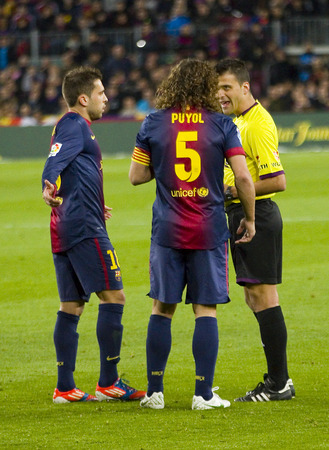 Carles Puyol in action during the Spanish League match between FC Barcelona and RCD Espanyol, 4 - 0, on January 6, 2013, in Barcelona, Spainのeditorial素材